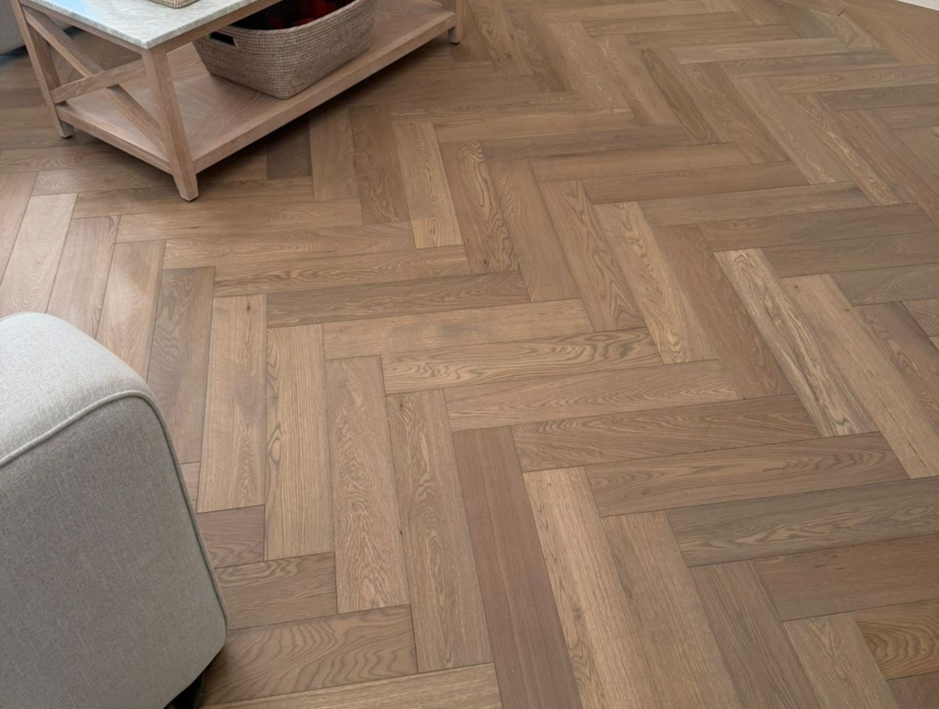 Herringbone oak flooring with brass inlay detail